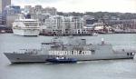 ID 1175 HMNZS TE MANA (F-111) a RNZN ANZAC-class frigate, manoeuvres off her Devonport base berth in Auckland, New Zealand. The cruiseship NORWEGIAN WIND can be seen departing the Auckland cruise terminal in...